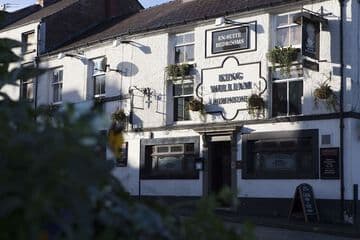 Accommodation at King William Rooms in woodford aerodrome