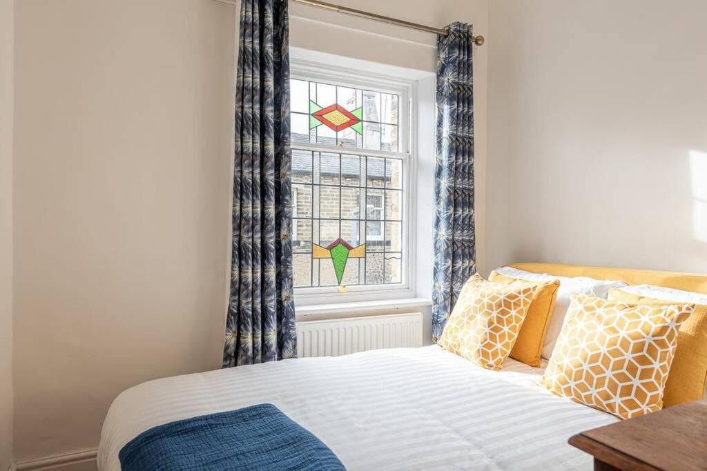 Accommodation at Cosy Mill Workers Cottage Heritage Saltaire in shipley