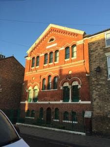 Accommodation at converted chapel filey floor to ceiling arch window in filey
