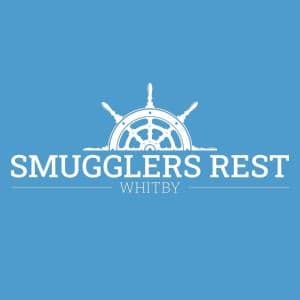 Smugglers Rest logo featuring a ship's wheel on a blue background, located in Whitby.