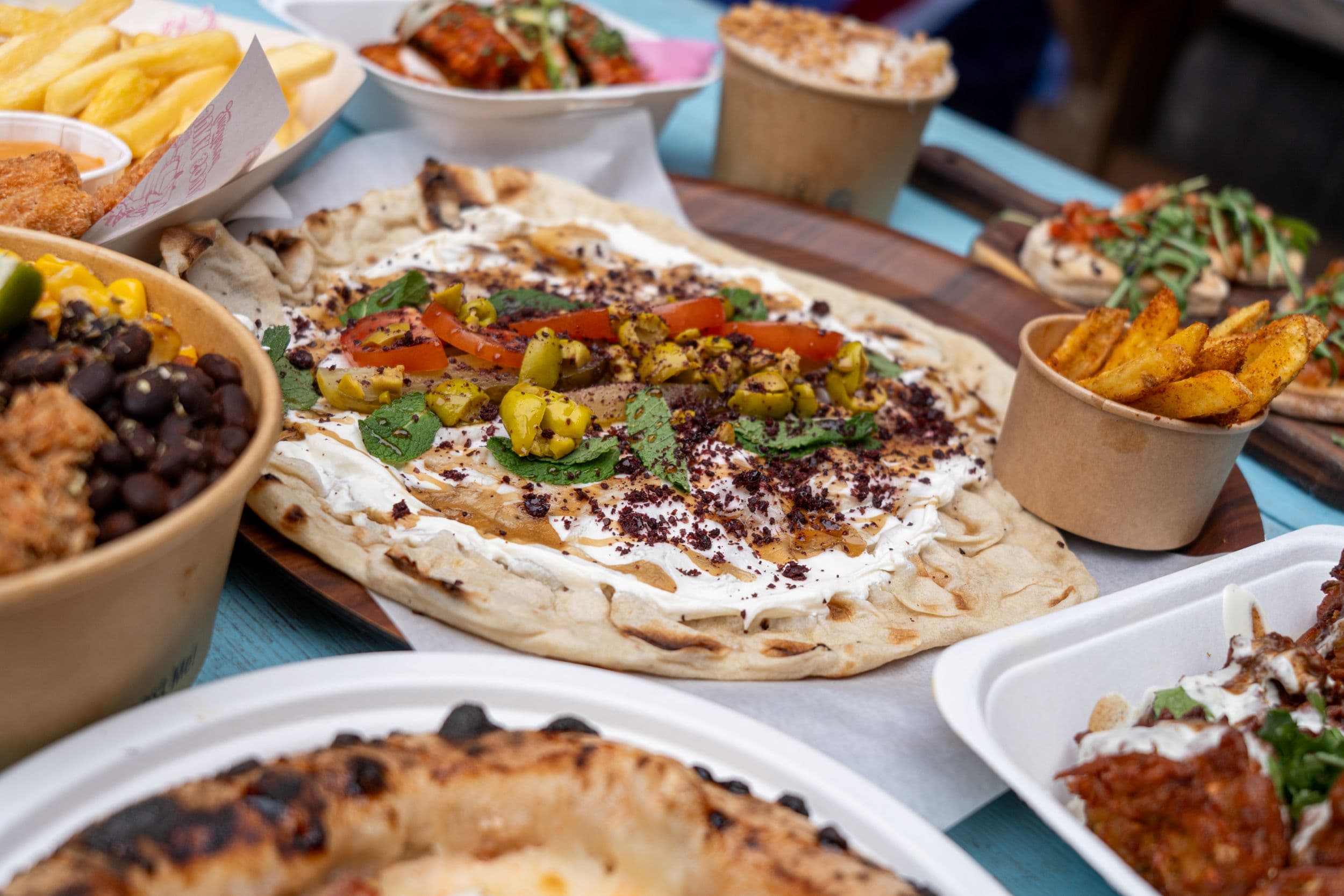 Assorted Yorkshire street food with flatbread and toppings