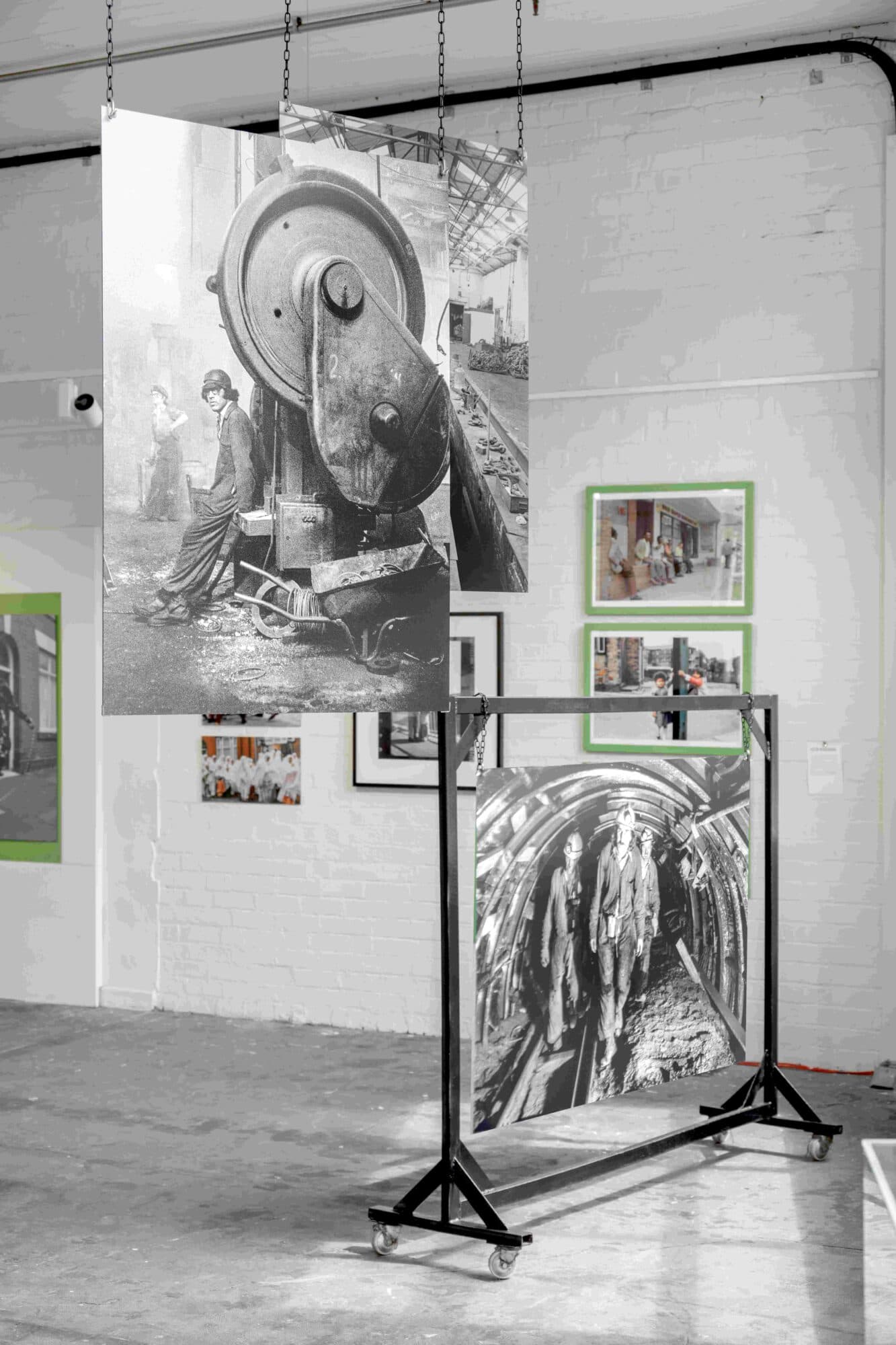 What Is the Many Hands Photography Exhibition About Working-Class Community at Sunny Bank Mills?