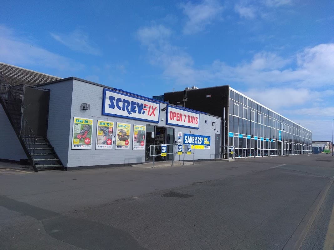 Screwfix shop in Bridlington with a large sign, open 7 days, and promotional posters on display.
