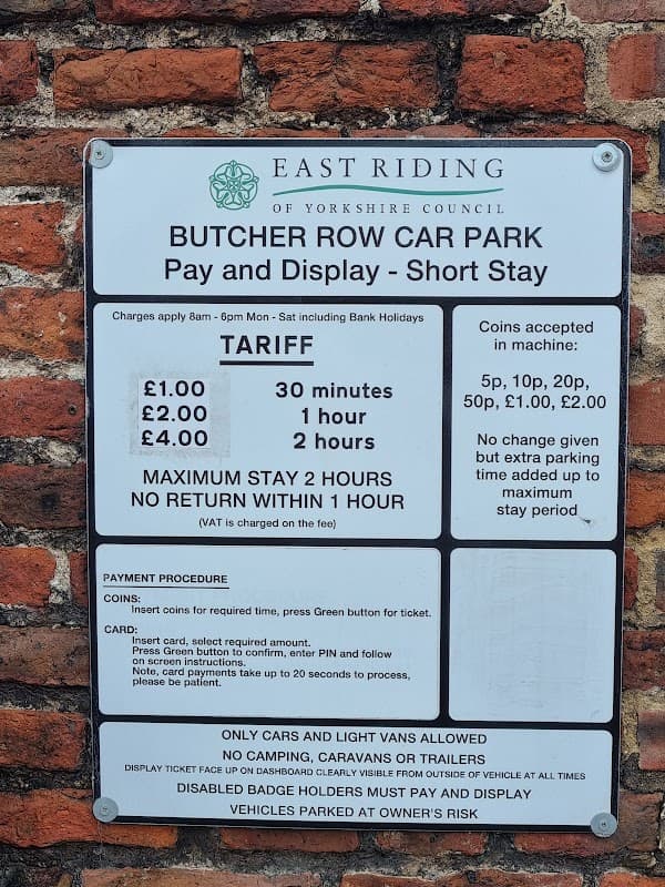 Sign for Butcher Row Car Park in Beverley, detailing parking fees, maximum stay, and payment procedures.