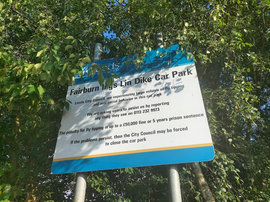 Sign for Fairburn Ings Newton Lane Parking, warning about tipping issues and potential closure by the City Council.