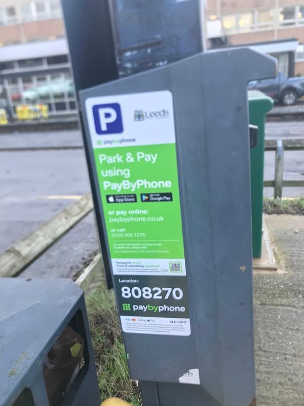 PayByPhone parking sign at Burley Road Car Park, Leeds, displaying parking instructions and location code.