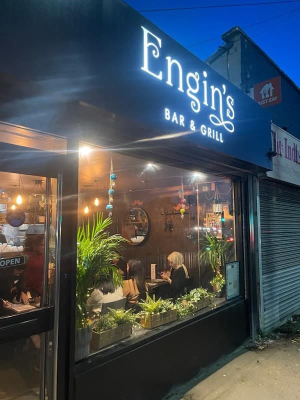 Dining at Enginβs Bar & Grill in manor