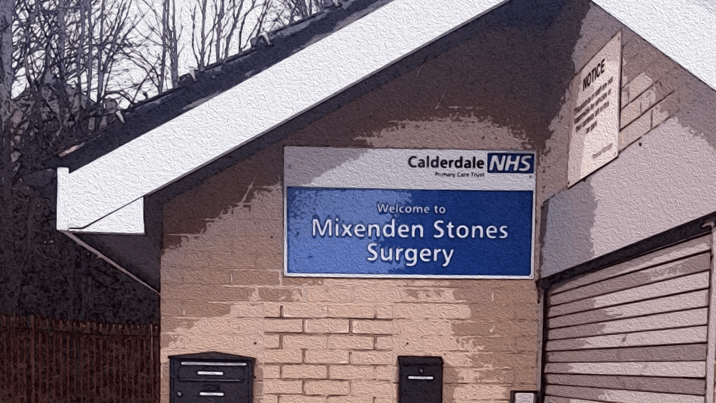 Sign for Mixenden Stones Surgery, part of Calderdale NHS, on a brick building in a wooded area.
