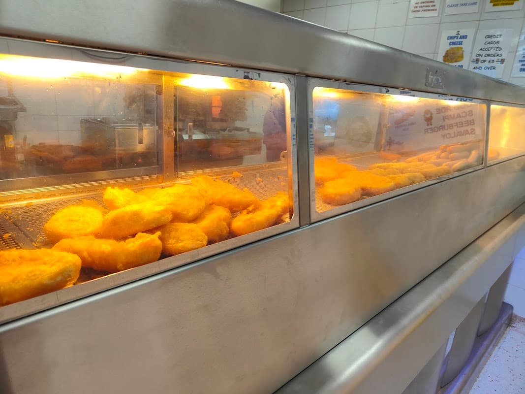 Fried food displayed in a heated glass cabinet at The Admiral 2 in Mosborough, Yorkshire.