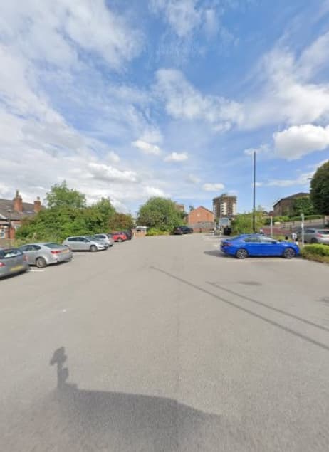 Pay & Display parking lot at 3 Shipton St, Neepsend, with several parked cars and a cloudy sky.