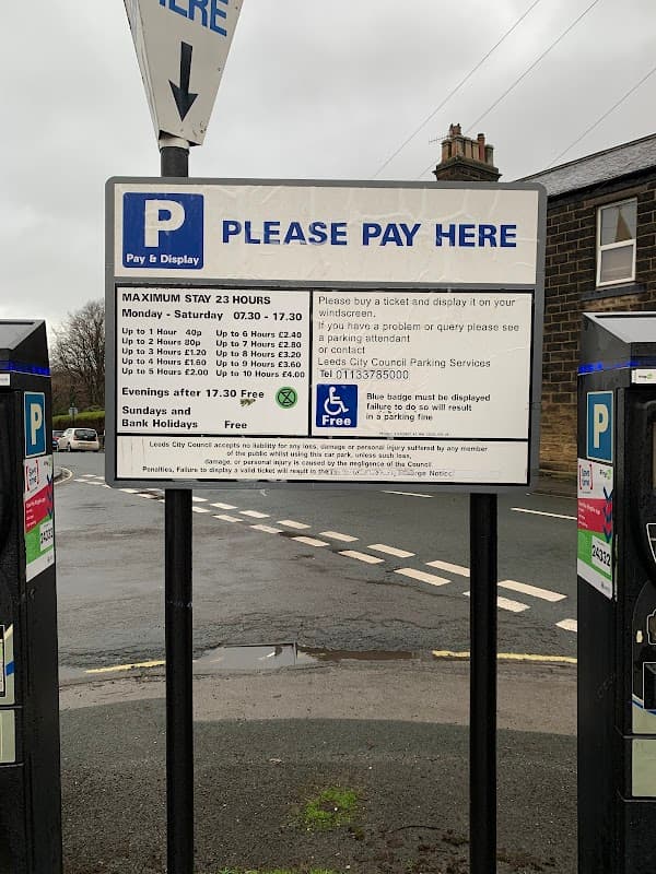 Pay and display parking sign with payment details and maximum stay information in Otley, Yorkshire.