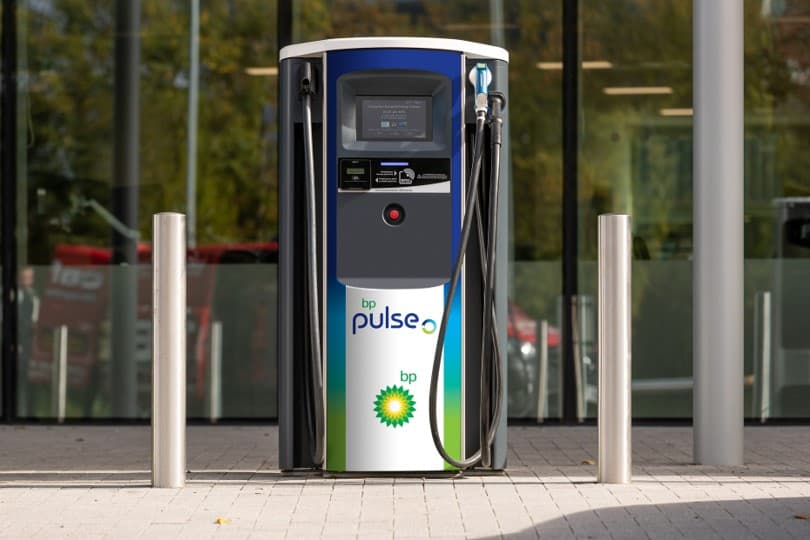 bp pulse electric vehicle charging station with a digital display, hoses, and BP branding, located in Penistone, Yorkshire.