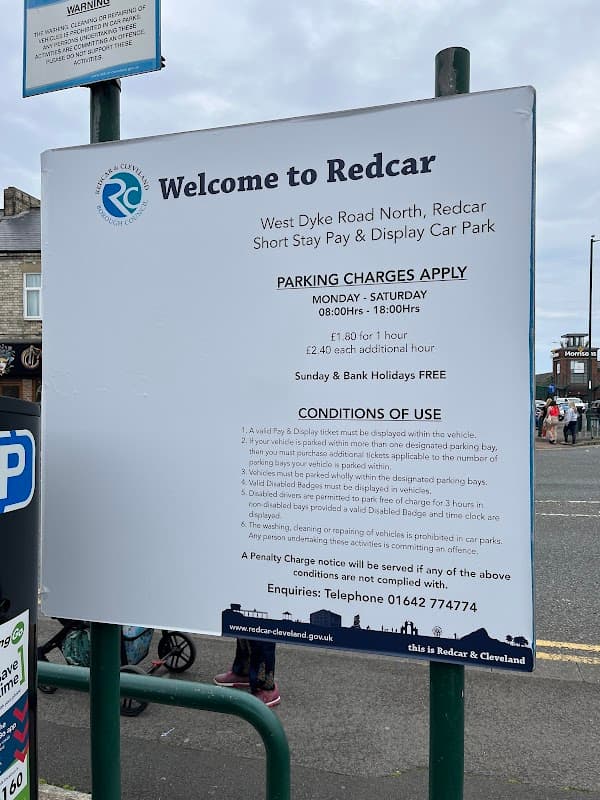 Sign for West Dyke Road North Car Park detailing parking charges and conditions in Redcar, Yorkshire.