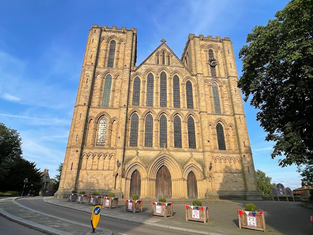 St Marygate Car Park with a view of the grand, historic Ripon Cathedral against a blue sky.