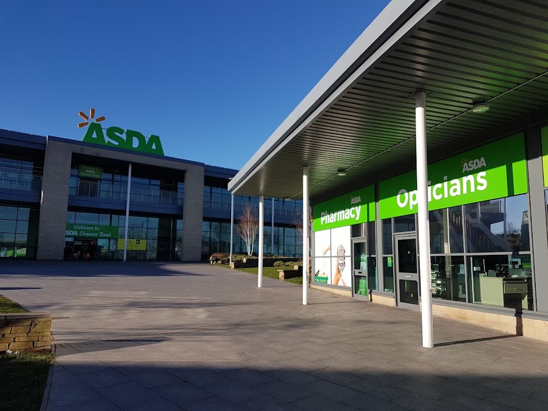 Asda Sheffield Chaucer Road Superstore entrance with bright signage, large windows, and a clear blue sky.