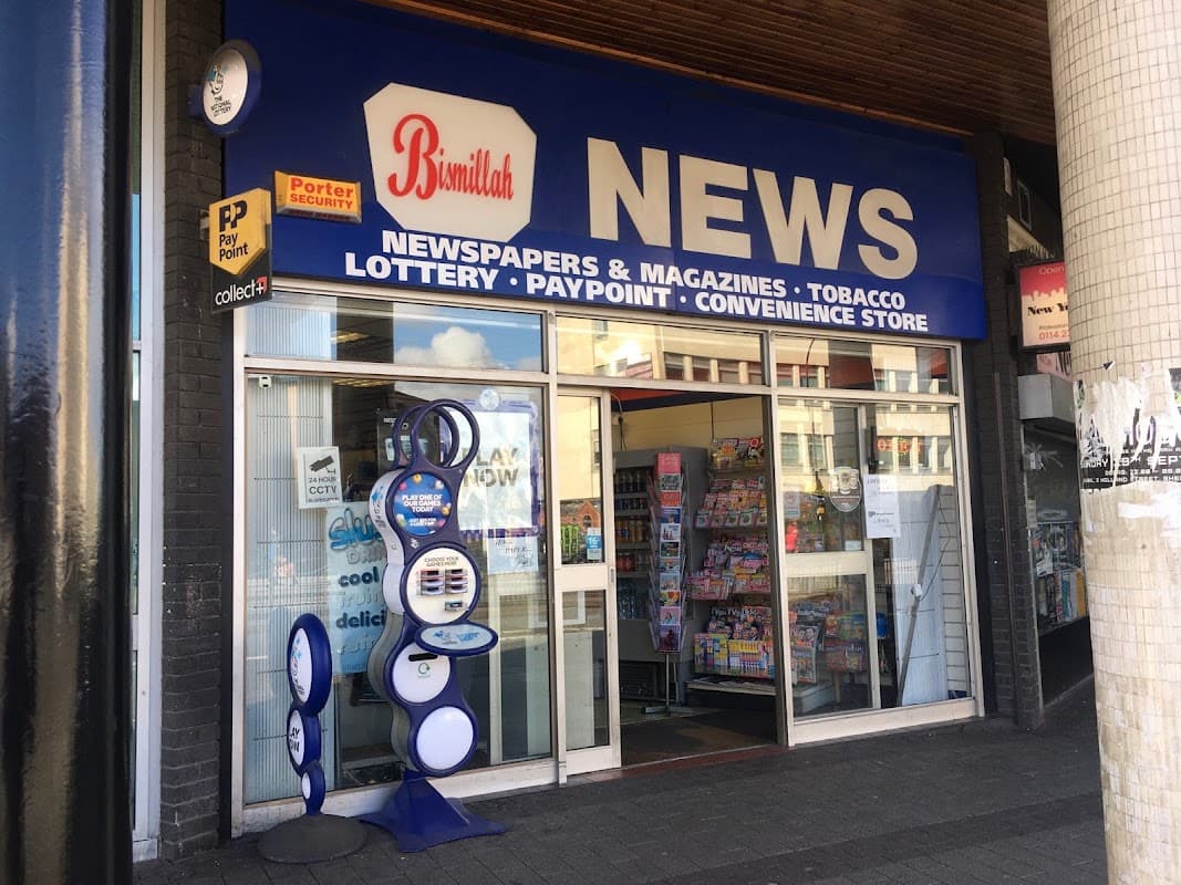 Bismillah News shopfront in Sheffield, featuring newspapers, magazines, and a convenience store entrance.