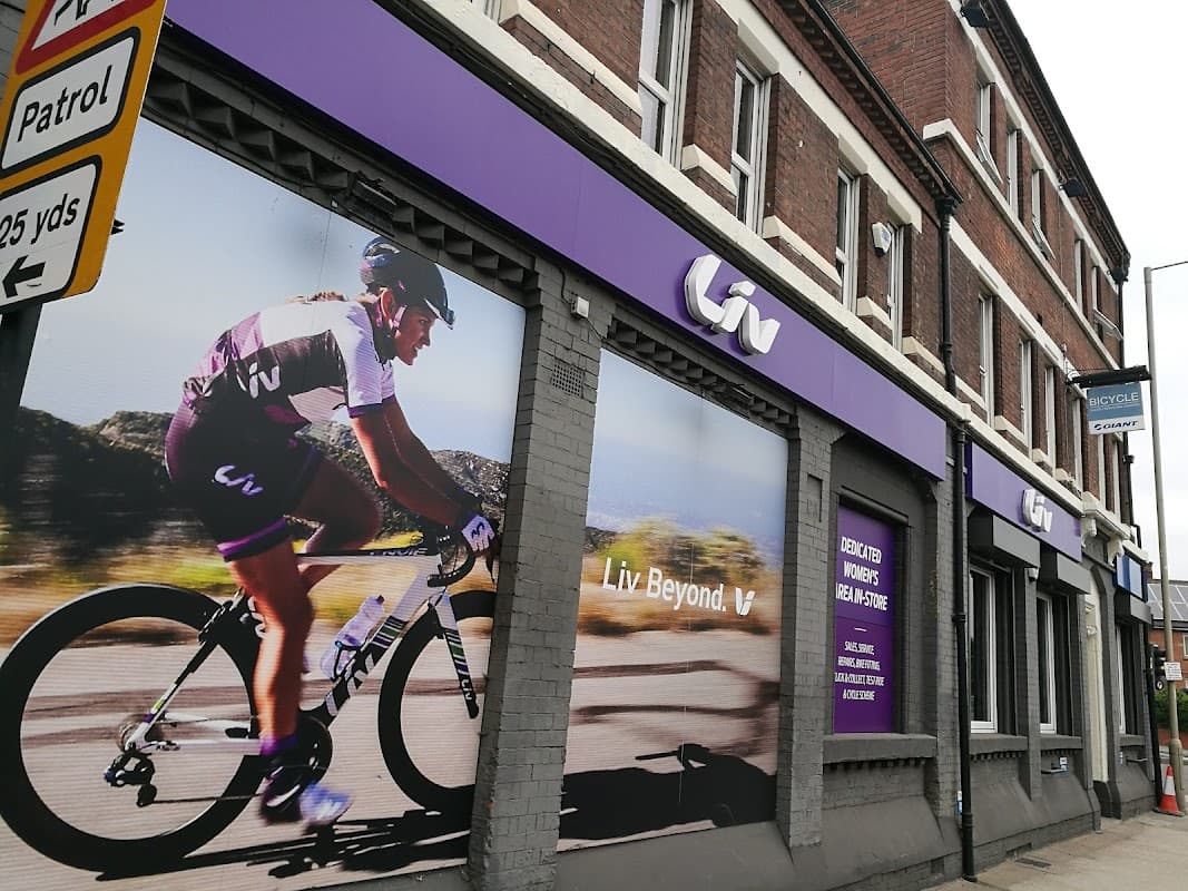 Giant Store Sheffield exterior featuring a large cycling mural and signage for Liv Beyond.