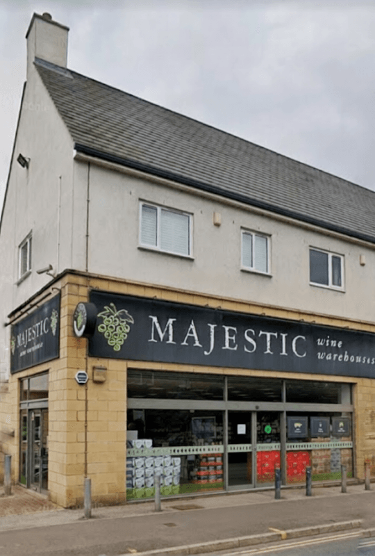 Majestic Wine store exterior with large windows, sign, and wine displays outside in Sheffield, Yorkshire.