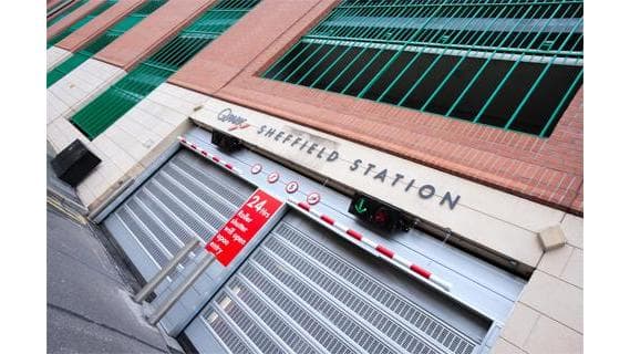 Q-Park Sheffield Station sign above a closed entrance with a red Pay & Display sign visible nearby.