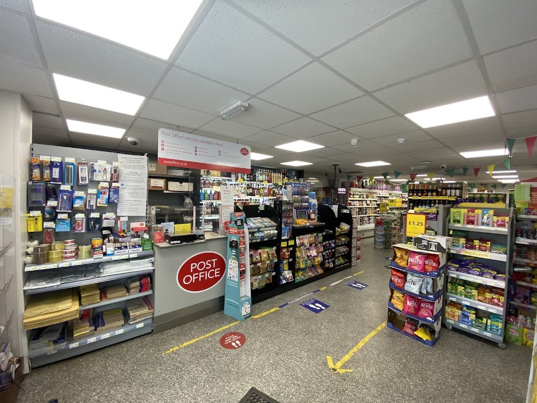 Bright cafe interior with shelves of snacks, drinks, and a prominent Post Office counter in South Cave, Yorkshire.