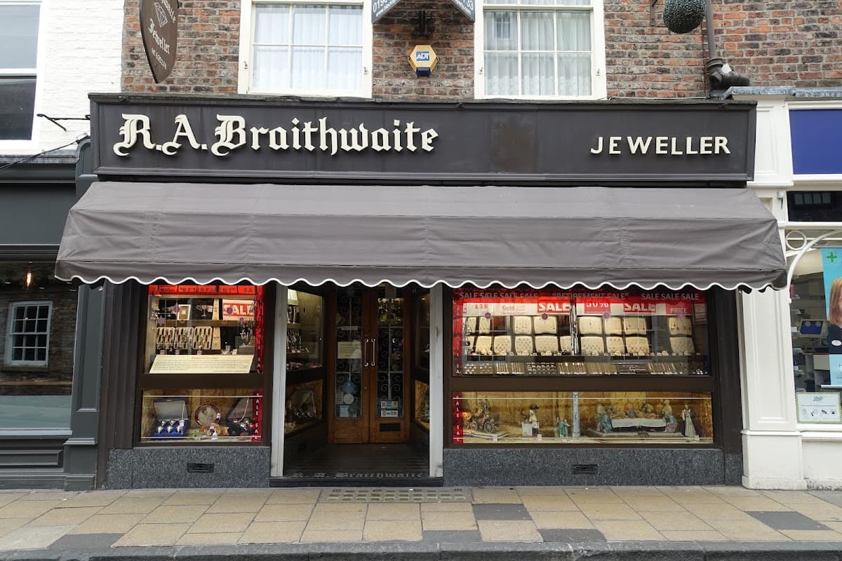 Storefront of R.A. Braithwaite Jewellers in York, featuring displays of jewelry and a "SALE" sign in the windows.