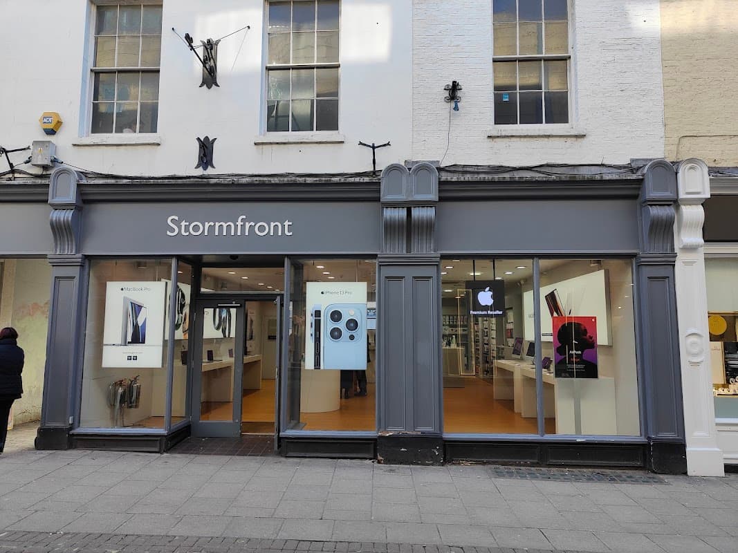 Stormfront Apple Premium Reseller storefront with large windows displaying Apple products and branding in York.
