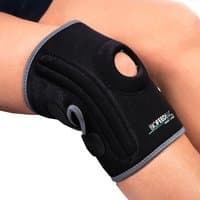 Black Biofeedbac knee support with gray trim, open patella design, and adjustable straps.