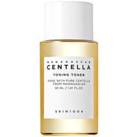 "Clear bottle of Skin1004 Centella Toning Toner, 30 ml, with gold cap and white label for sensitive skin exfoliation"