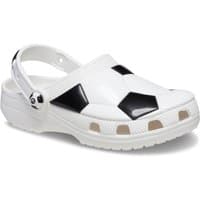 White Crocs Kids Classic Fun Lab Clog with black soccer ball design, adjustable heel strap, and ventilation ports.