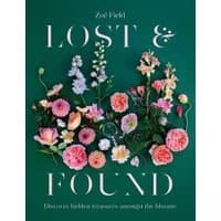 Book "Lost and Found" with colorful flowers on green cover, by Zoë Field.