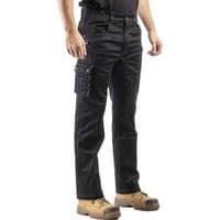 Black Caterpillar Operator Fx trousers, size 36, with multiple pockets and reinforced knees, worn with tan work boots.