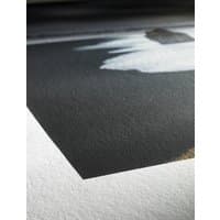 Hahnemühle Photo Rag White Matt paper with textured surface, featuring a printed black and white abstract design.