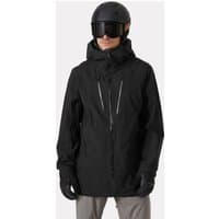 Black Helly Hansen men's ski shell with hood, front zippers, and adjustable cuffs, worn by a model with helmet and goggles.