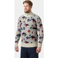 White wool knit sweater with colorful Nordic patterns and a ½ zip collar, worn by a male model.