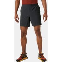 Grey Helly Hansen men's shorts, elastic waistband, knee-length, lightweight fabric, worn by model with red shirt.