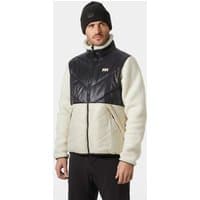 Black Helly Hansen hybrid jacket with quilted chest, white fleece sleeves, and zip pockets, worn by a male model.