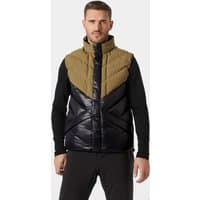 Brown Helly Hansen men's puffy vest, 2XL, with quilted design and high collar, worn over a black long-sleeve shirt.