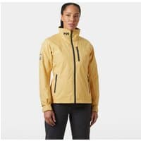 Beige Helly Hansen women's sailing jacket with black zippers, high collar, and logo on chest and sleeve.