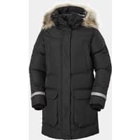 Black Helly Hansen women's waterproof down parka with fur-trimmed hood, large pockets, and reflective sleeve accents.