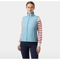 Blue Helly Hansen women's vest, quilted texture, high collar, front zipper, worn over striped long-sleeve shirt.