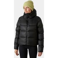 Black Helly Hansen women's down jacket with hood, quilted design, and front pockets, worn by a model.