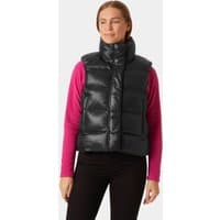 Black Helly Hansen women's puffer vest with high collar, front zipper, and quilted design, size small.