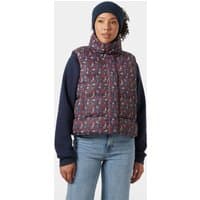 Navy Helly Hansen women's vest with floral pattern, high collar, and zip closure, worn over a long-sleeve shirt.