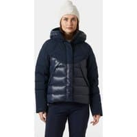 Navy Helly Hansen women's down jacket with quilted pattern, hood, and front zipper, worn by model.