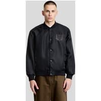 Black Lyle & Scott varsity jacket with embroidered crest, button-up front, ribbed cuffs, and collar.