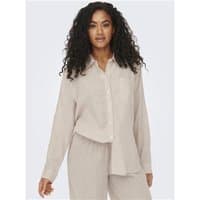 Beige long-sleeve linen blend shirt with button-up front and relaxed fit, worn by a model.