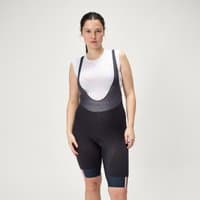 Women's FS260 DropSeat™ Bib Shorts in Neon Peach with black straps and a sleek, aerodynamic fit.