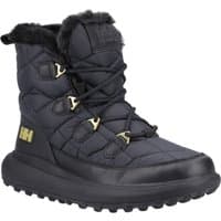 Black Helly Hansen Willetta 2 Mid Boots with fur lining, gold eyelets, and textured sole, size 6.