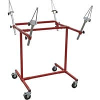 Red Sealey alloy wheel painting stand with four adjustable arms and caster wheels.