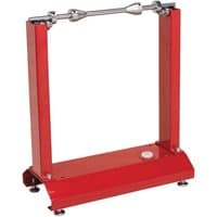Red Sealey motorcycle wheel balancer with adjustable arms and sturdy base.